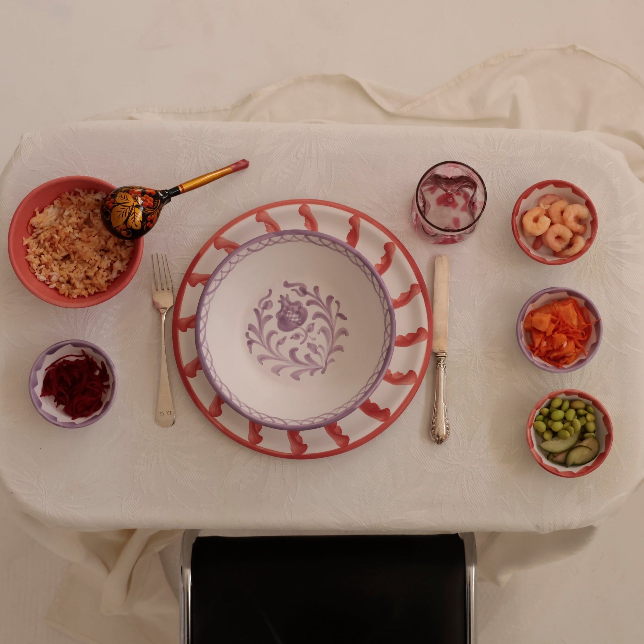Pasta Bowl. Granada collection. Table setting with a decorative plate and various dishes on a white tablecloth. - lifestyle