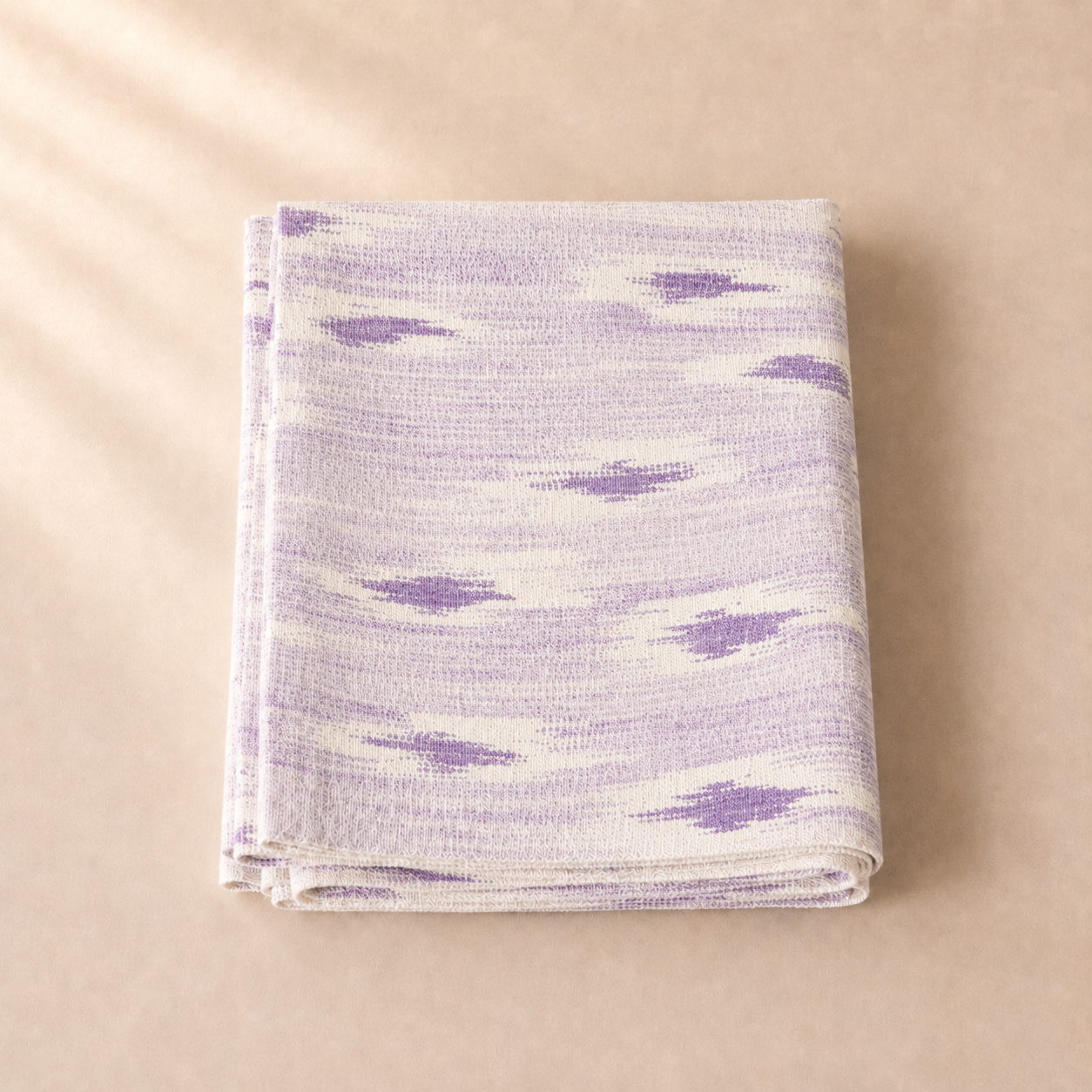 Table runner with purple abstract pattern on a beige background