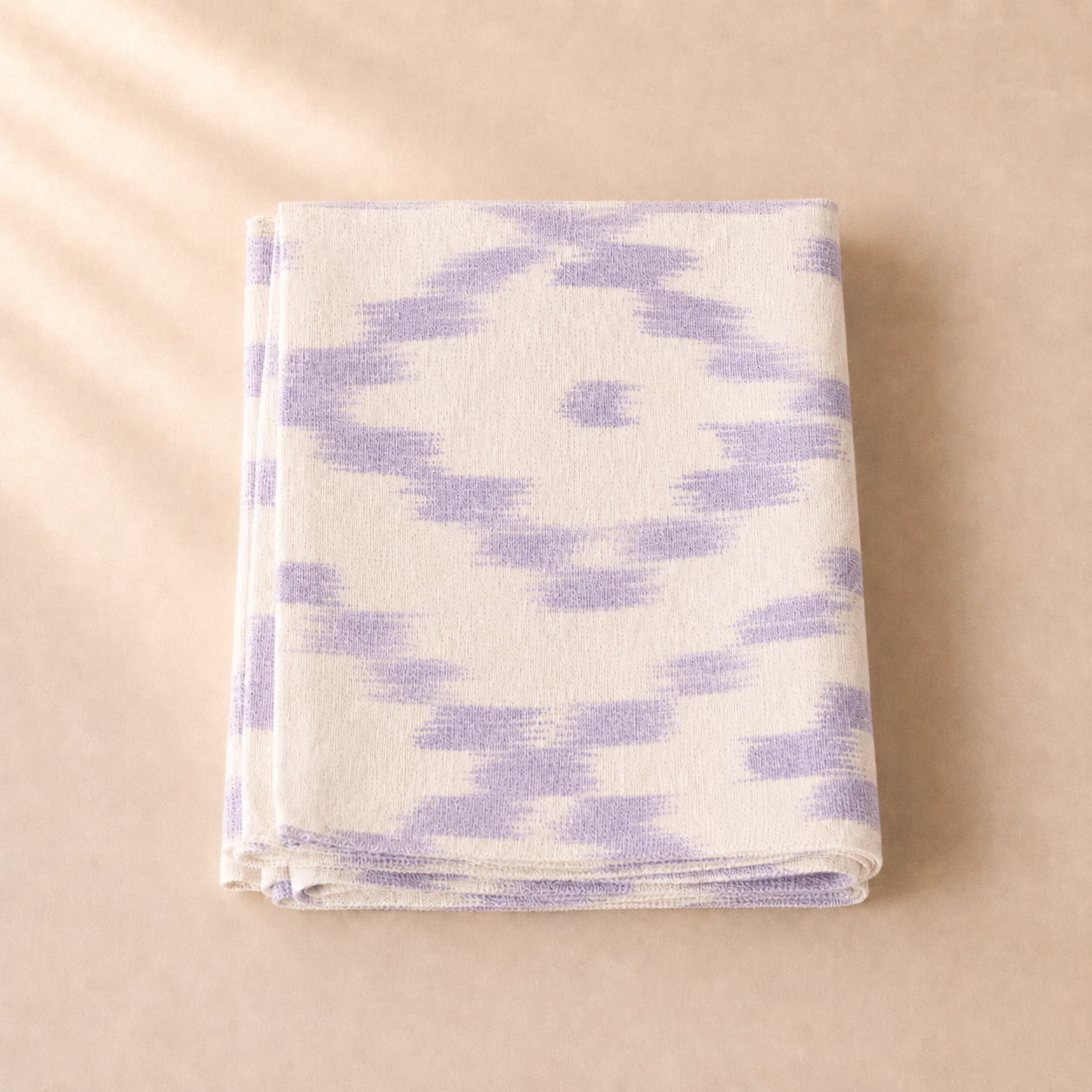 Table runner with purple abstract pattern on a beige background