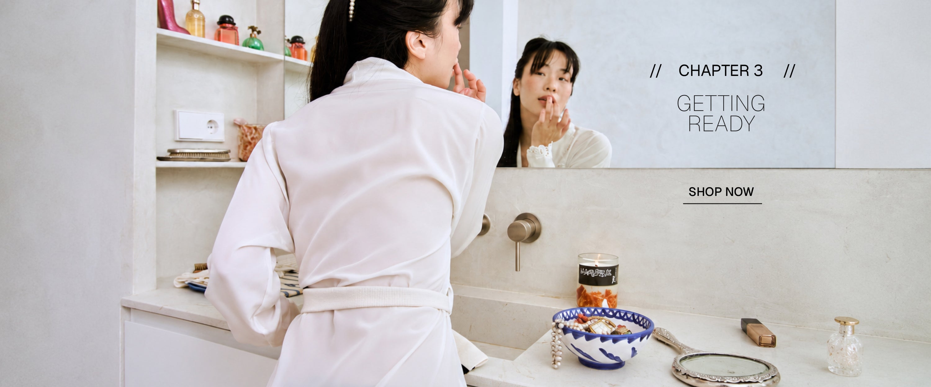 Woman in a white robe standing in front of a bathroom mirror with a product advertisement overlay.