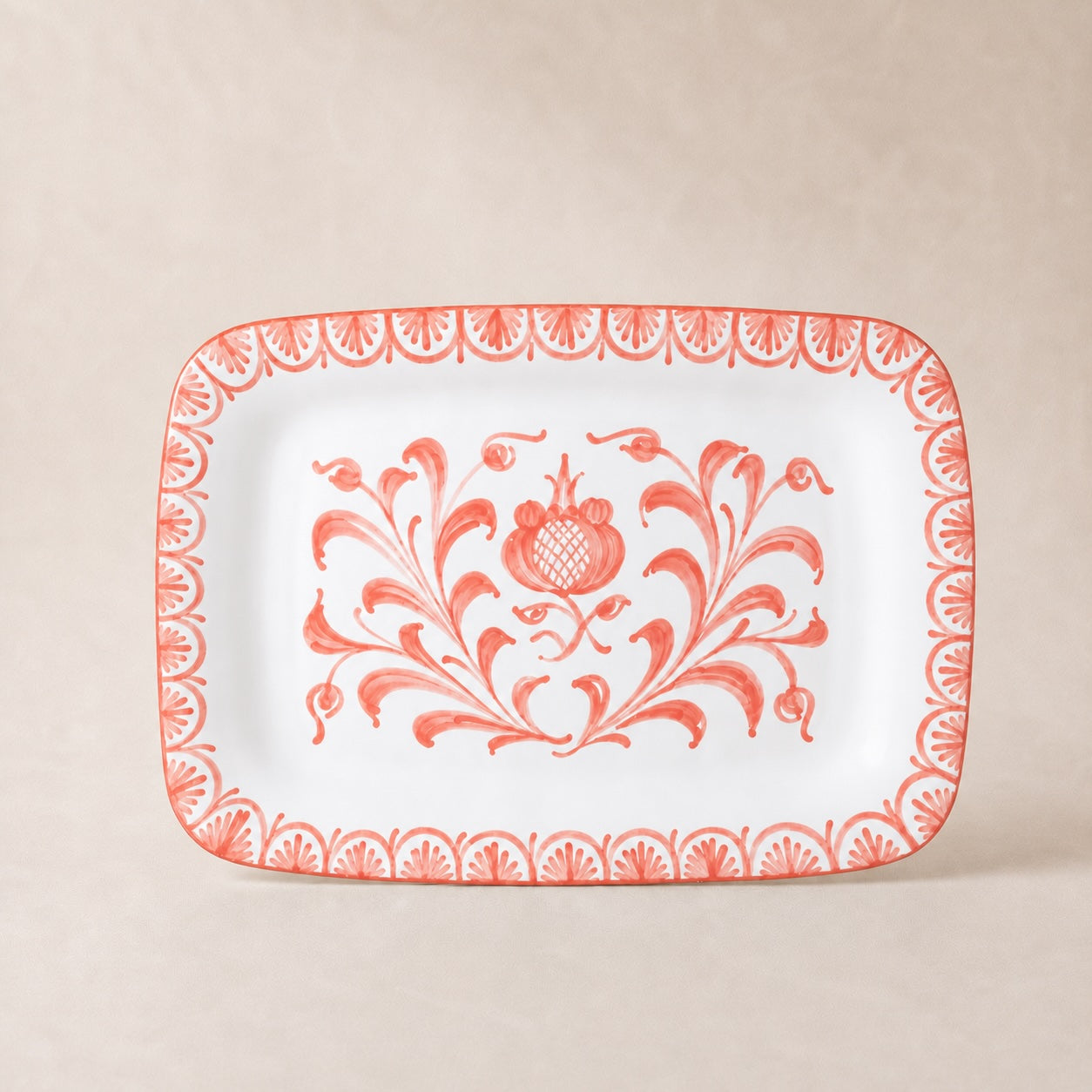 Rectangular plate with floral pattern on a beige background