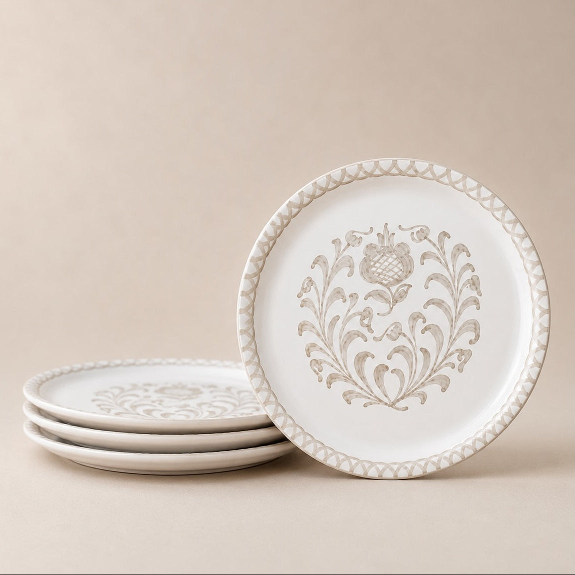Set of decorative plates with floral patterns on a beige background