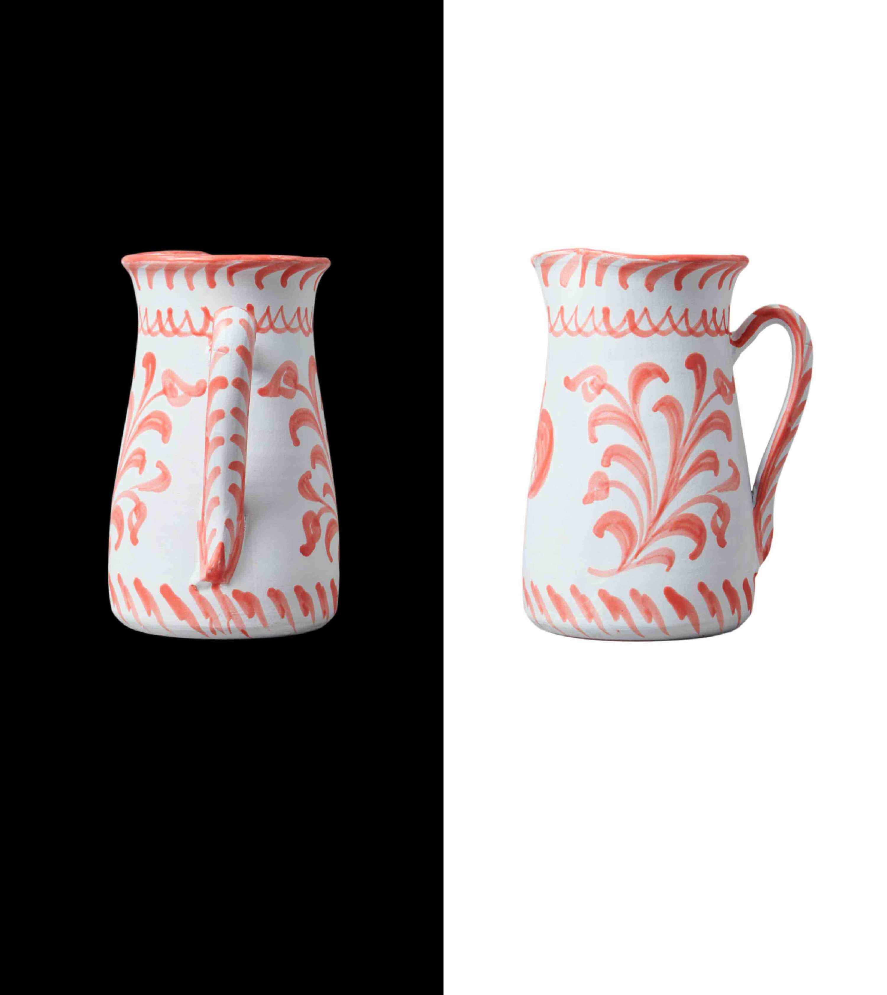 013 wide pitcher with traditional design made for cold bear, but we love it for fresh flowers, lemonade, or gazpacho. Handcrafted by traditional artisans in Granada coral