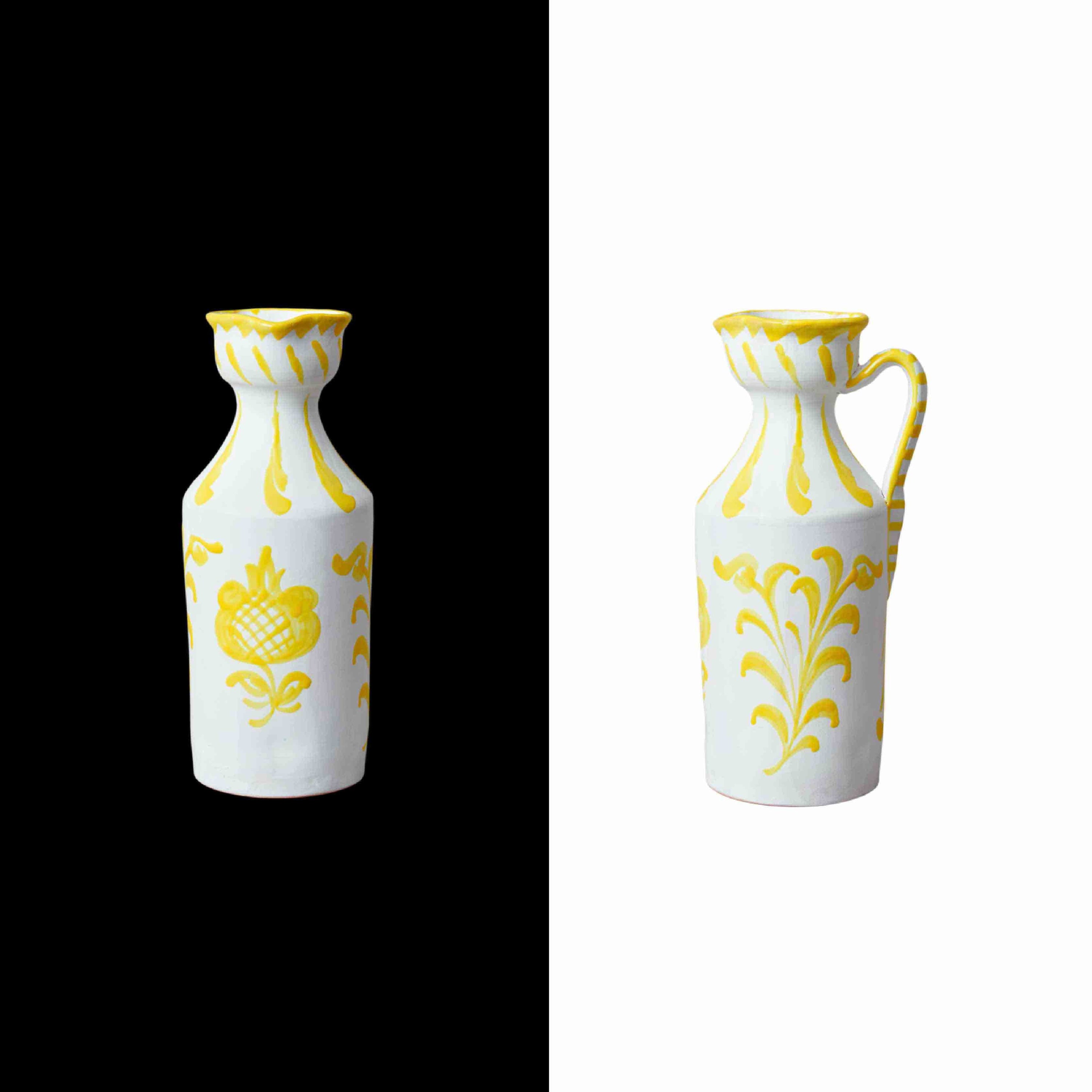 014 narrow pitcher with traditional design made for fine Spanish wine, but we love it for fresh flowers, lemonade, or gazpacho. Handcrafted by traditional artisans in Granada