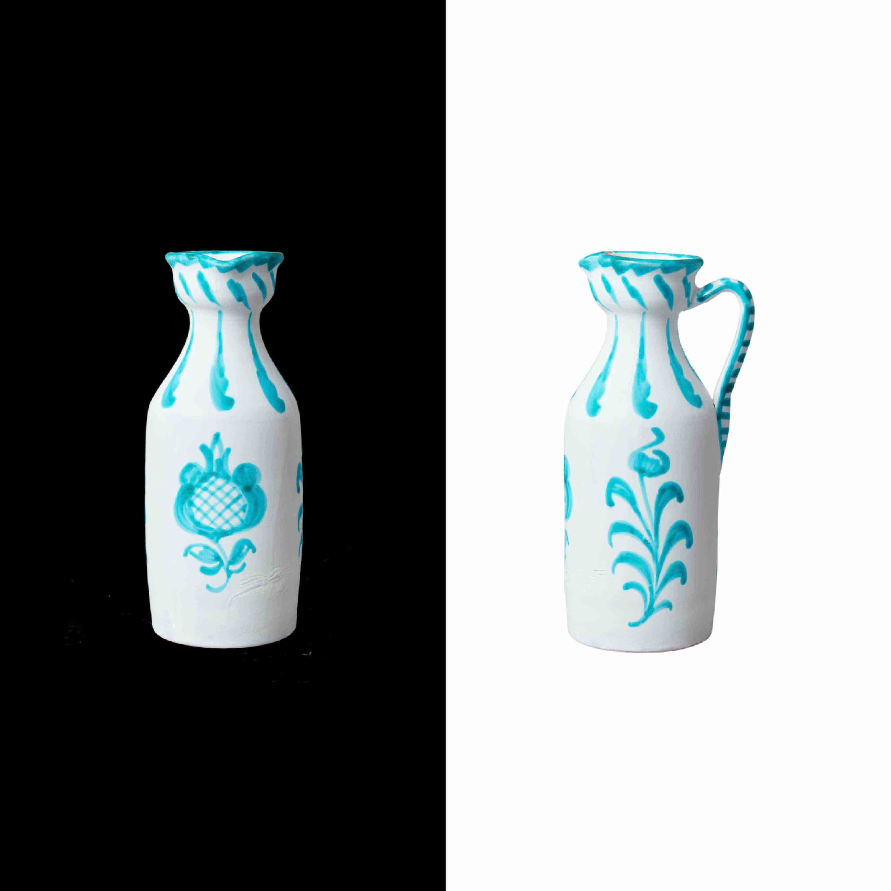 014 narrow pitcher with traditional design made for fine Spanish wine, but we love it for fresh flowers, lemonade, or gazpacho. Handcrafted by traditional artisans in Granada