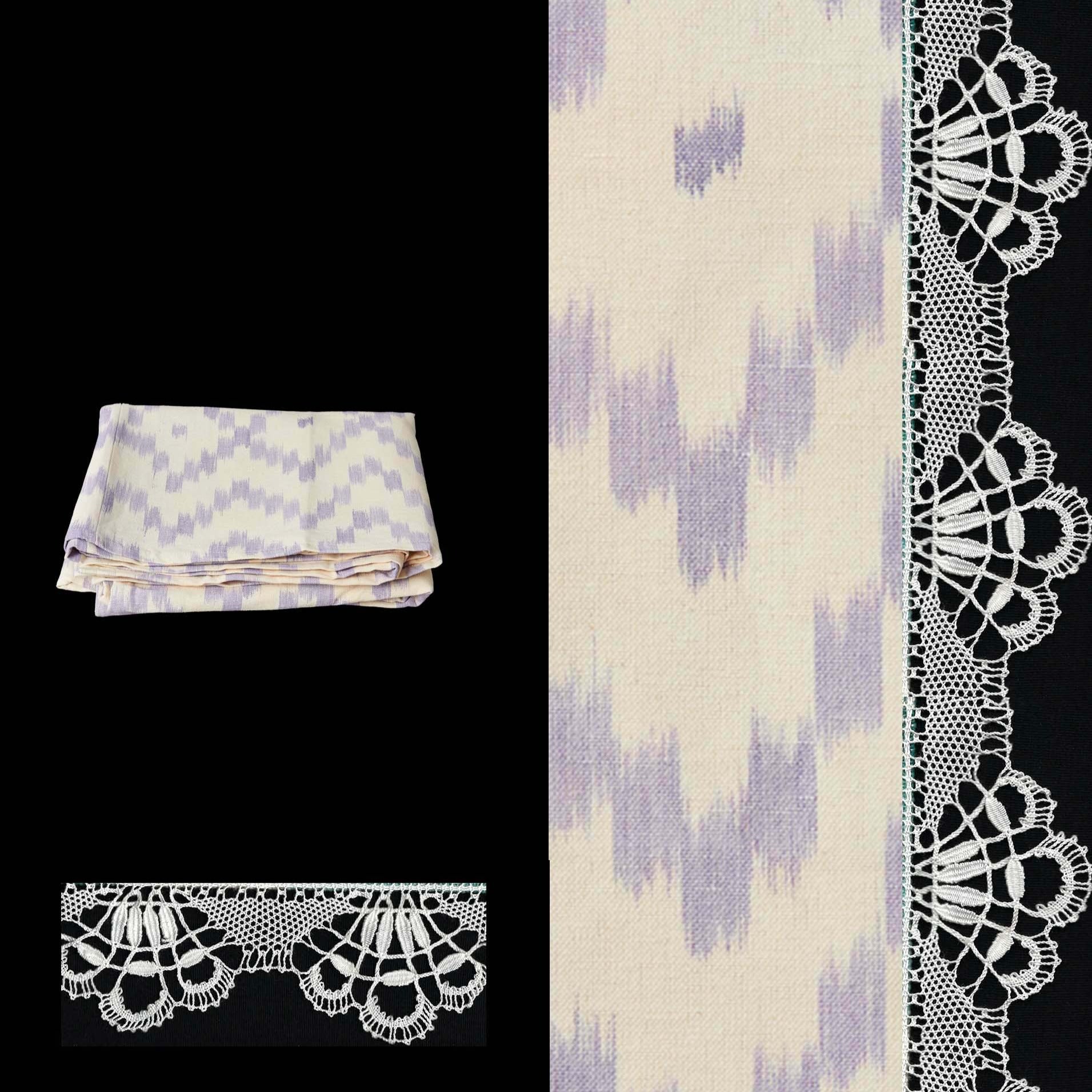 lilac tablecloth ikat design roba de llengues linen cotton tablecloth handmade by traditional artisans in Mallorca with bobbin lace from Camariñas